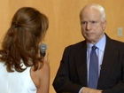Woman makes emotional plea to McCain over Syria