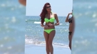 Amy Childs Dons a Neon Bikini on the Beach