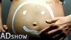 Pregnant belly art: smile!